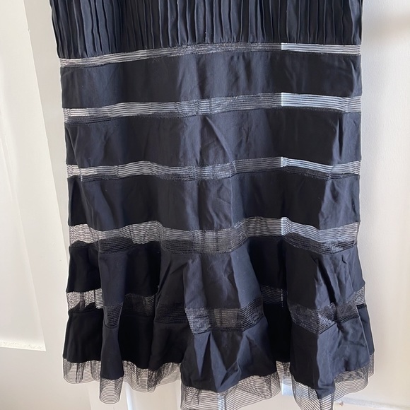 Long, chic black Tadashi Shoji gown with mesh-like panels and ribbed midsection - Picture 4 of 12